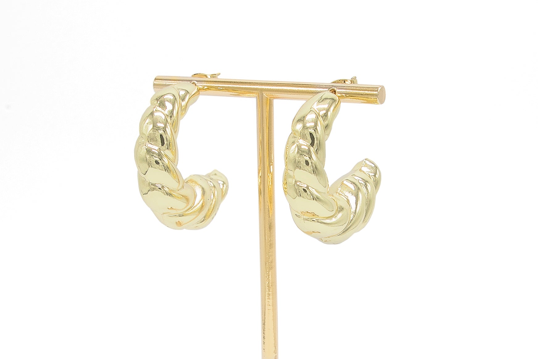 Arete dorado curveado