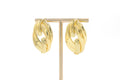 Arete dorado trenzado
