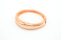 Pulsa laminada rose gold circular